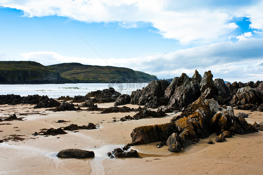 苏格兰阳光海洋高地岩石旅行波浪沙木海岸海岸线海滩图片