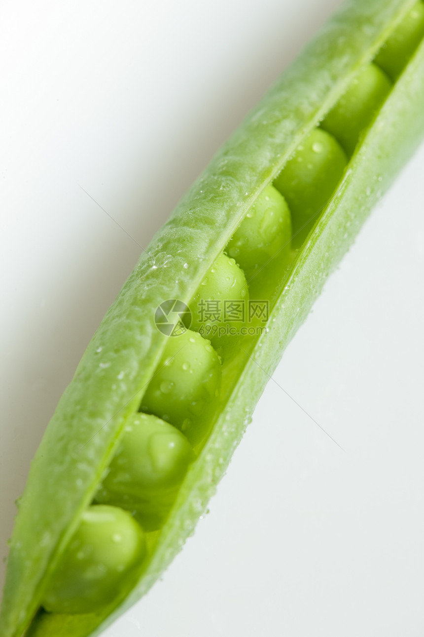 近在眼前的豌豆绿色营养静物豆类食物飞沫食品维生素蔬菜脉冲图片