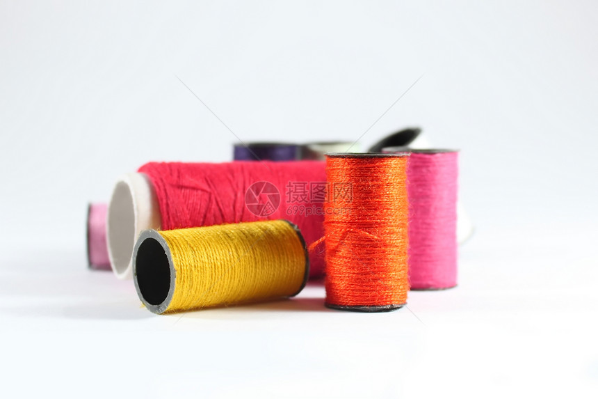 线索羊毛黄色橙子团体纺织品卷轴棉布细绳物品宏观图片