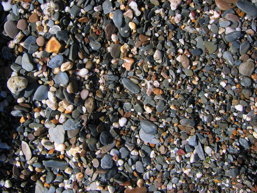 石头娱乐支撑海浪卵石旅行地面海滩海岸晴天异国图片