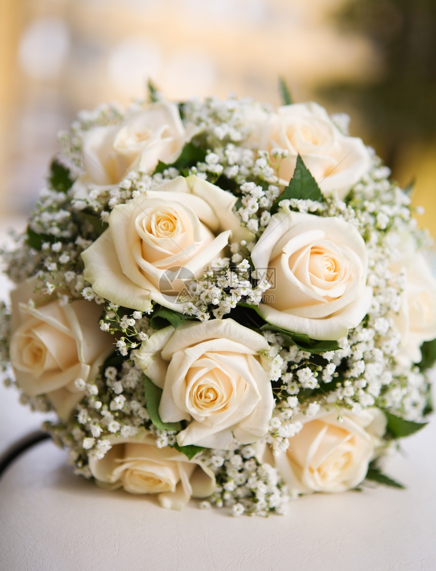 新娘的花束花朵铭文婚姻已婚褐色婚礼玫瑰宏观图片