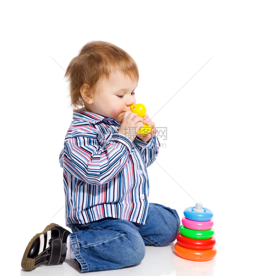 男孩玩游戏幸福孩子塑料好奇心婴儿金发喜悦乐趣头发童年图片