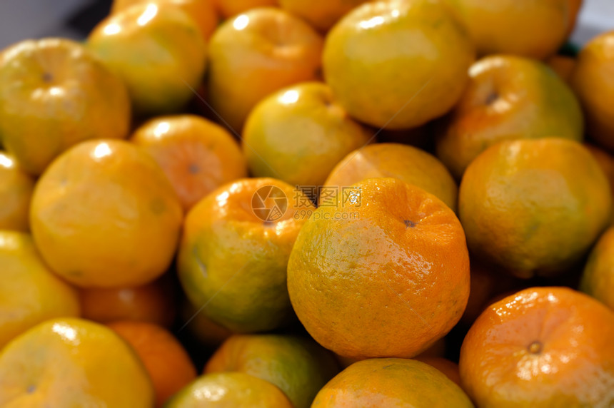 坦格林圆圈水果甜点果汁橙子圆形热带食物黄色团体图片