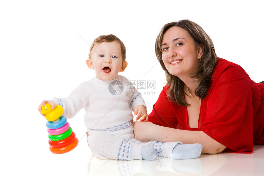 母亲与婴儿玩耍裤子微笑收集亲热快乐压痛金发家庭红色白色图片