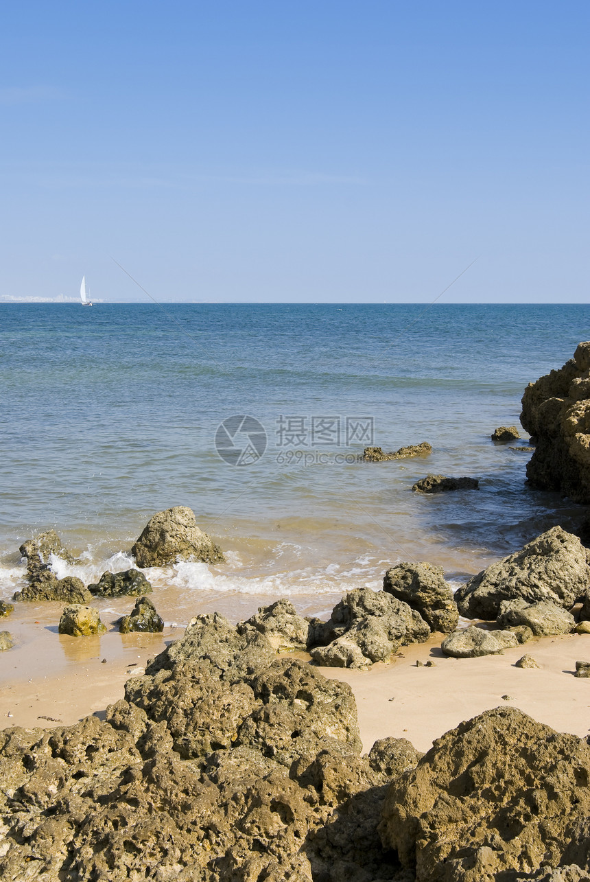 乌亚海滩和克利夫斯海浪海滩海岸运动棕色悬崖蓝色岩石海洋图片