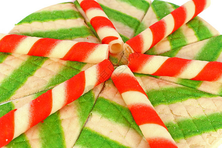 蛋糕装饰糖果盘子绿色黄色白色派对食物红色管子背景图片