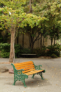 橙色长椅棕色绿色城市橙子座位木头公园场景背景图片