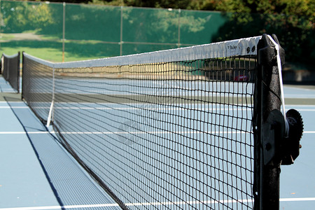 网球网闲暇白色场地黄色娱乐网球游戏运动高清图片