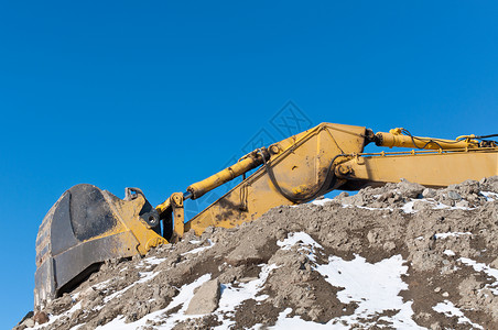 运土冬季的液压挖掘器设备水平照片地球挖掘机背景