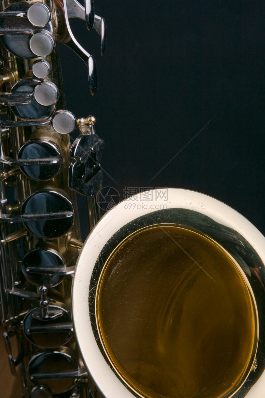 萨克斯风乐器弱光记录会议金属喇叭黄铜萨克斯管芦苇工作室图片