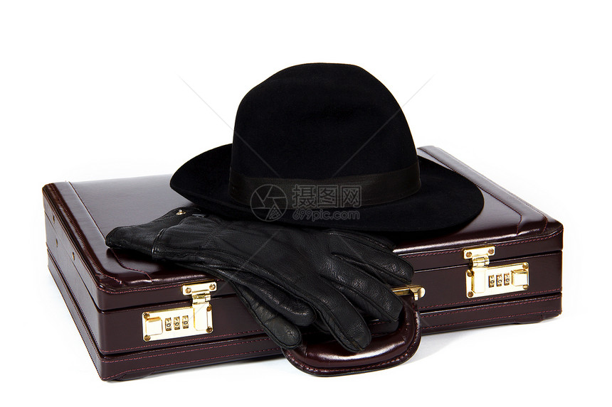 从帽子和手套上铺起的手提箱配饰商业衣服棕色水平包装白色剪裁公文包文件夹图片