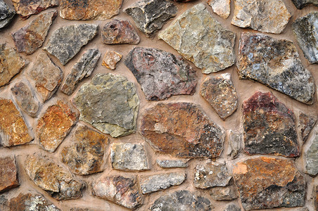 岩石墙背景背景巨石石头花岗岩棕色棕褐色背景图片