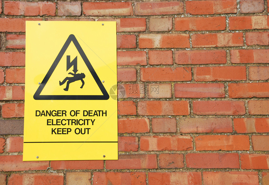 高压电压标志三角形力量死亡危险电气石头禁令风化警告工程图片