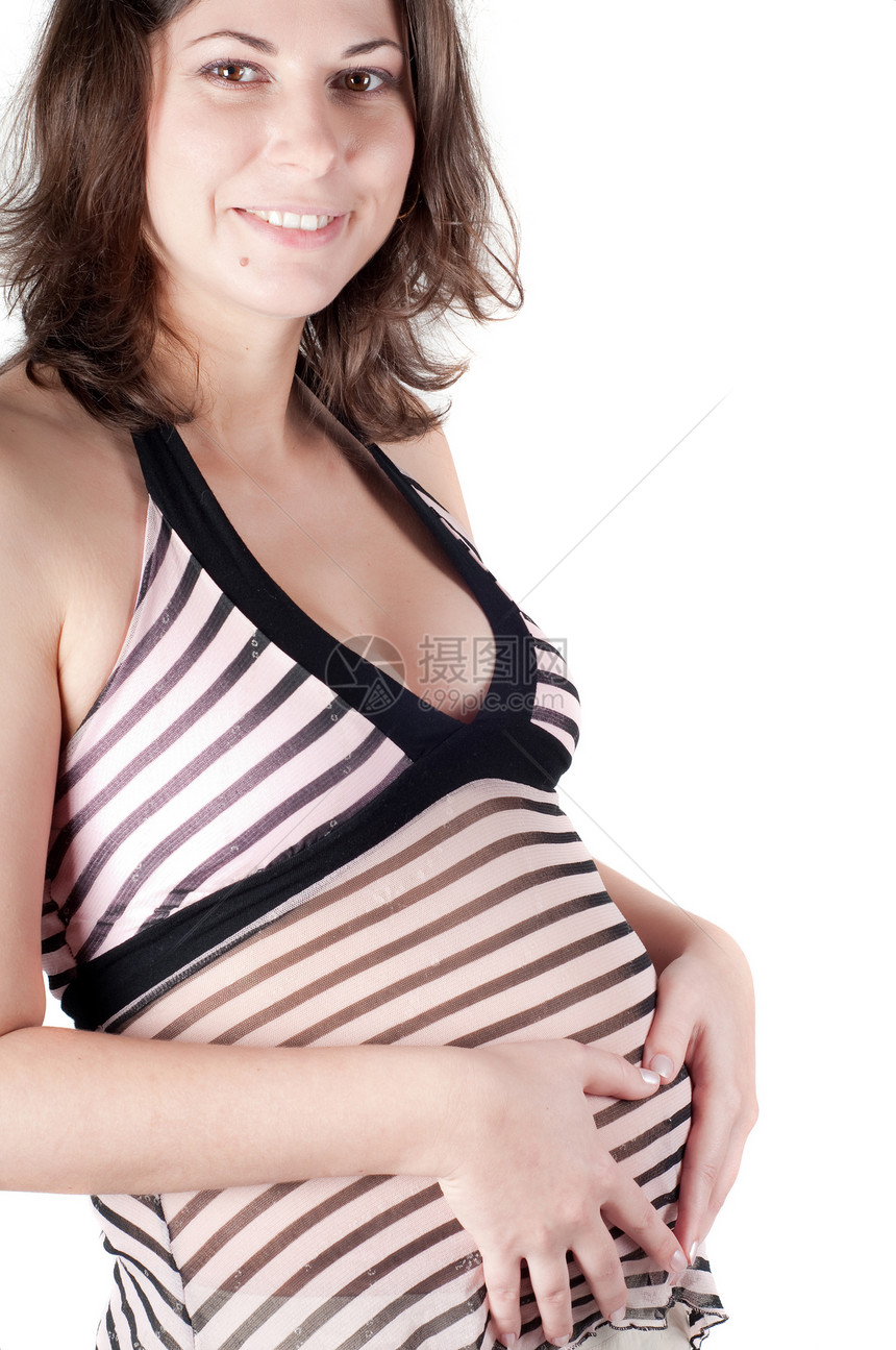 孕妇用心脏标志式的手肚子产妇生活婴儿父母皮肤白色女孩女性条纹图片