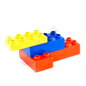 构块砖块红色塑料玩具幼儿园童年积木白色背景图片