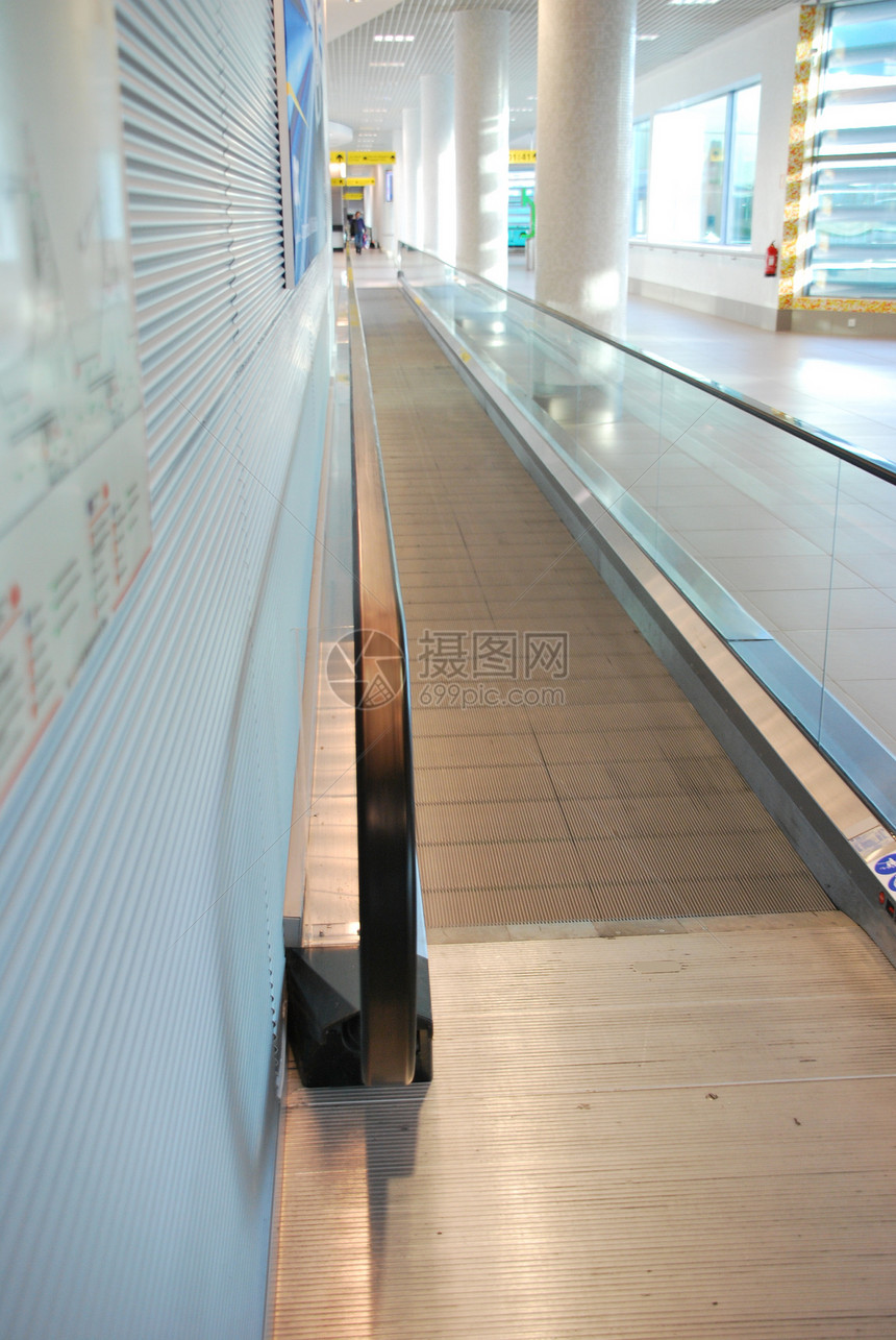 现代扶梯走廊人行道建筑学金属地面交通飞机场玻璃反射速度图片