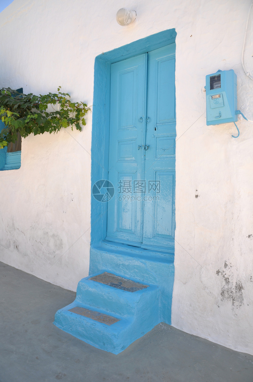 希腊语房屋蓝色旅游旅行花朵房子建筑学入口文化街道木头图片