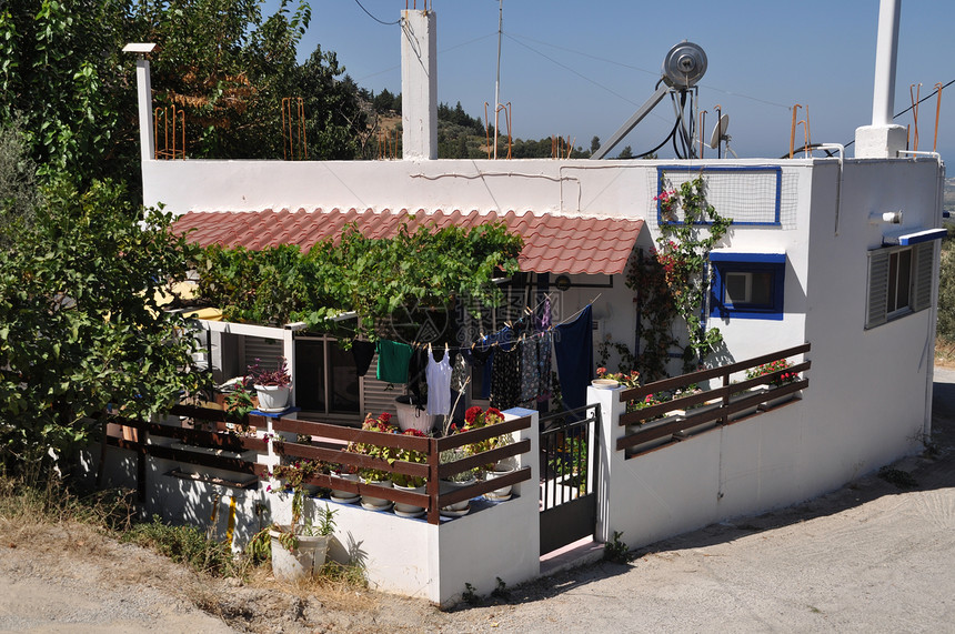 希腊语房屋历史花瓶场景绳索住宅花园卵石窗户蓝色衣服图片