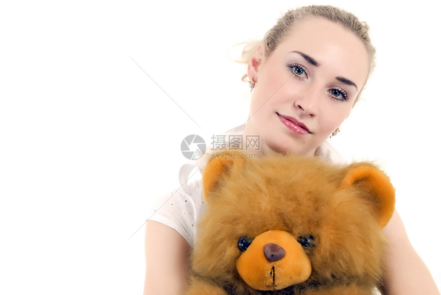 带泰迪熊的年轻女子微笑礼物梦想家快乐美丽乐趣工作室思维玩具女士图片