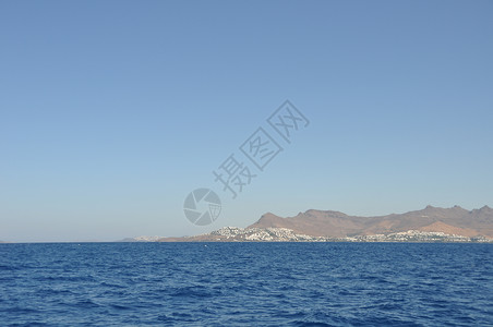 土耳其博德鲁姆蓝色天空风景海岸线旅行地平线假期海浪海岸海景背景图片