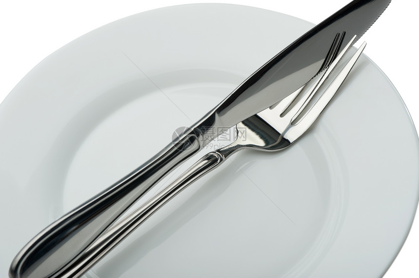 刀和叉在盘子上桌子用具奢华午餐晚餐厨房阴影金属剪裁刀刃图片