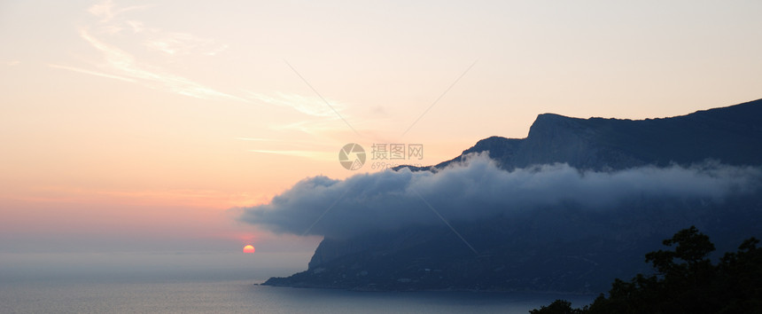 日落波纹场景天气岛屿海浪风景天堂橙子太阳戏剧性图片