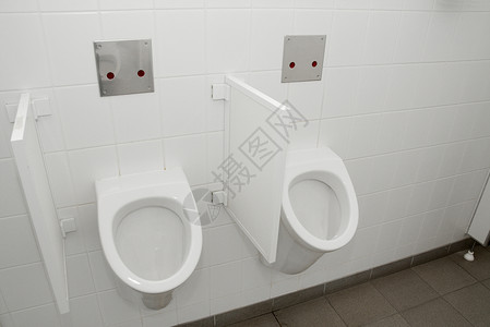 小便池厕所排尿洗漱洗手间绅士们卫生壁橱瓷砖设施民众公用事业背景