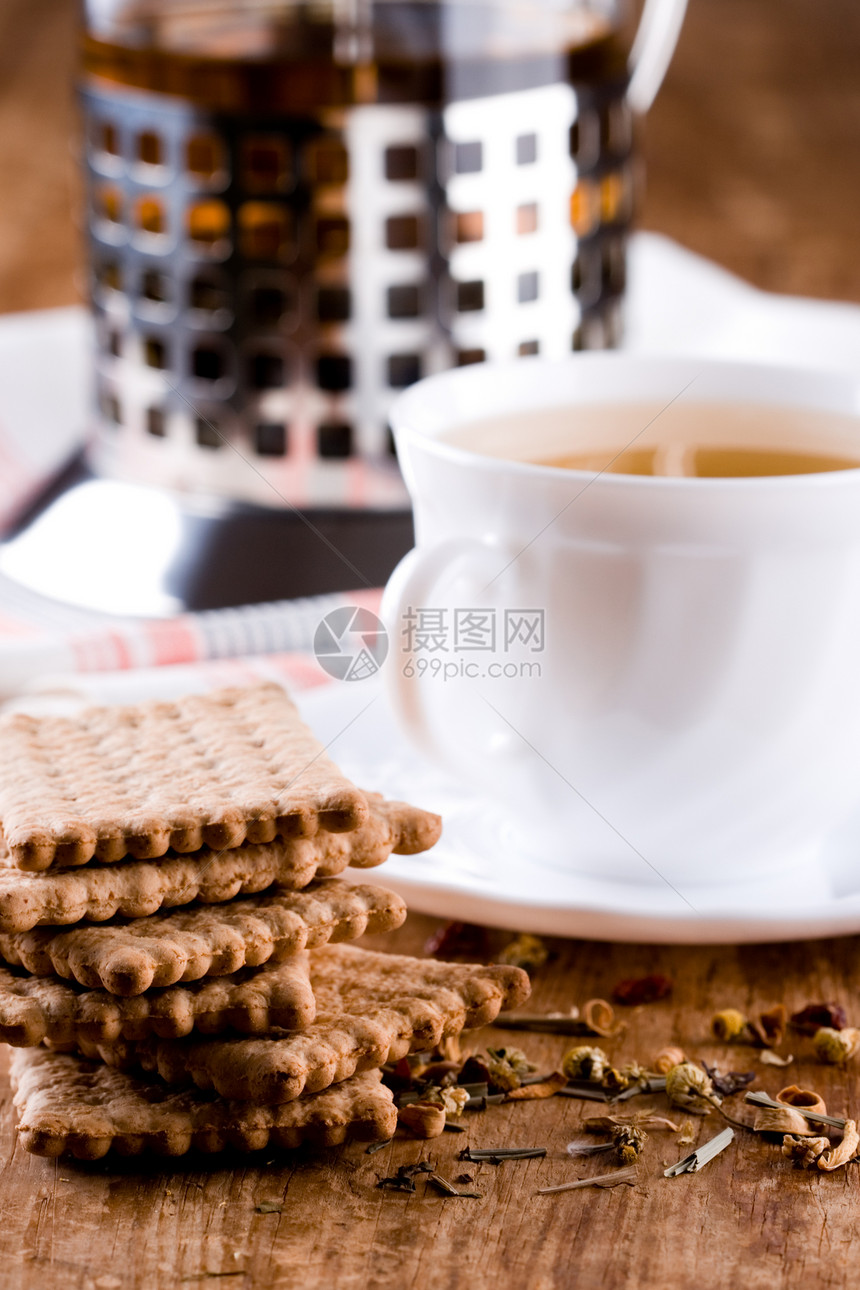 草药茶和新鲜饼干木头陶瓷食物媒体飞碟餐巾杯子纺织品蛋糕补品图片
