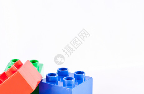 构块幼儿园童年塑料砖块红色白色玩具积木背景图片