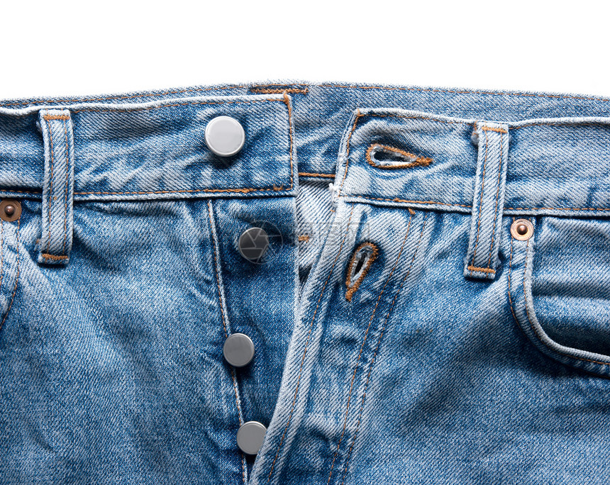 让蓝色缝纫按钮织物材料纺织品牛仔布拼接宏观裤子图片