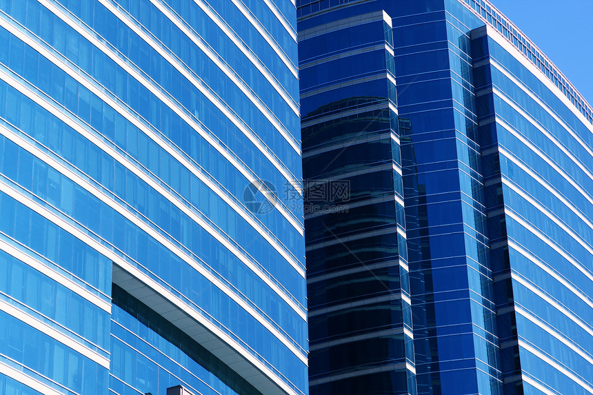 现代建筑天空城市合金玻璃中心财富窗户蓝色金融反射图片
