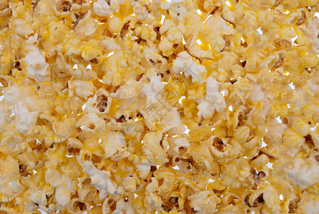 背景的流行玉米食物流行音乐白色黄色爆米花背景图片