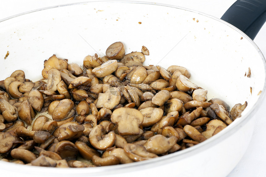 锅煎蘑菇图片
