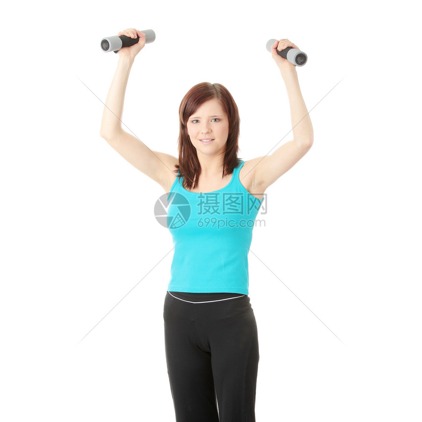 有哑铃的女孩闲暇重量力量健身运动员运动有氧运动训练女性微笑图片