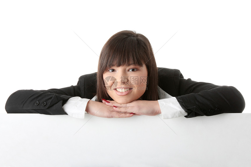 一个漂亮的商业女商务人士 拿着空白的牌子衬衫木板床单女孩广告营销展示学生快乐卡片图片