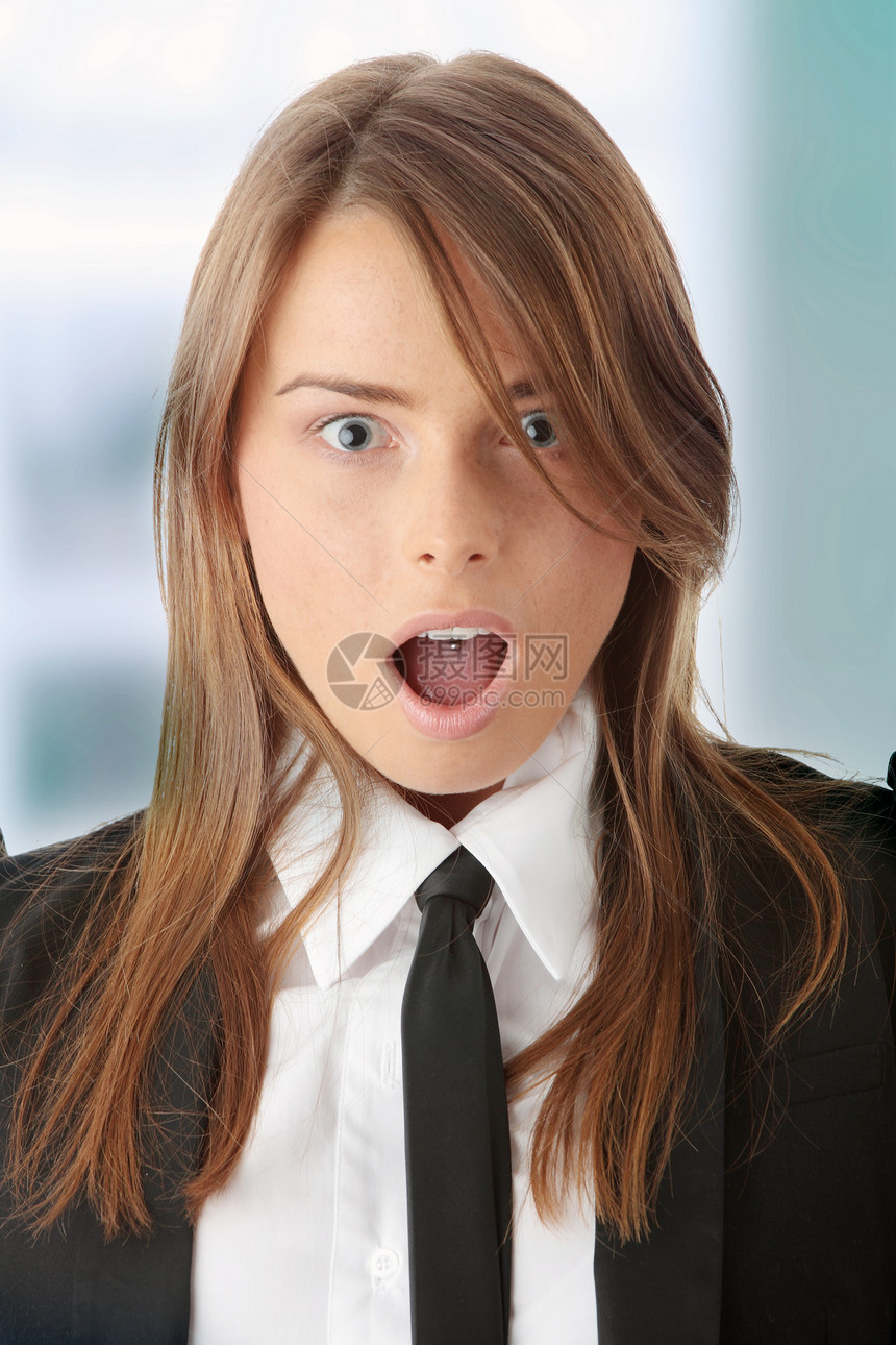震惊的女商务人士商业女士青年青少年头发女性惊喜套装学生牙齿图片