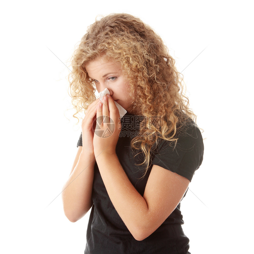年轻的金发年轻女子感冒发烧保健症状鼻子眼睛女孩疾病女性疼痛手帕图片