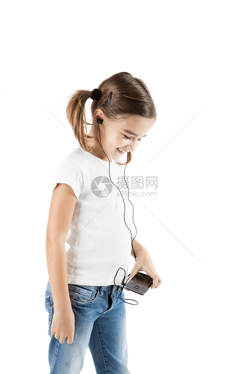 听音乐地面音乐播放器孩子乐趣女孩快乐微笑娱乐儿童白色图片