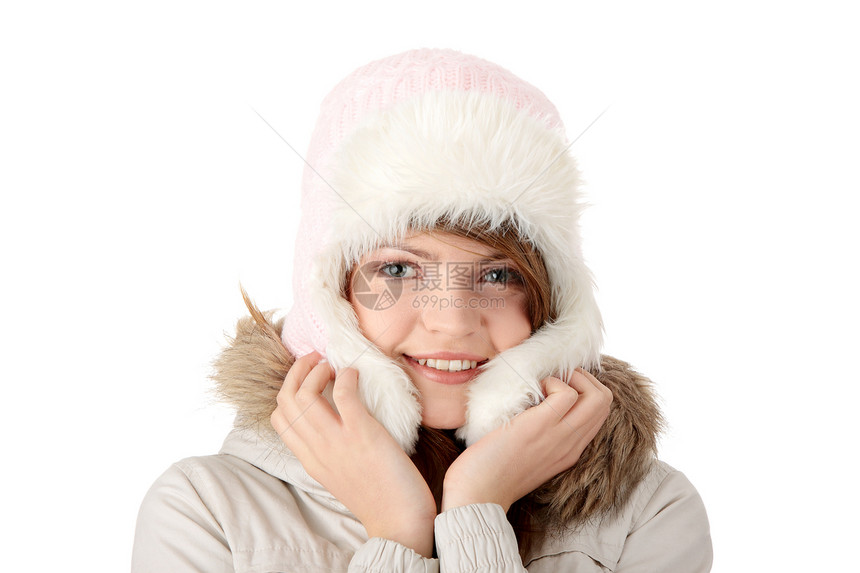 美丽的年轻女性肖像帽子夹克毛皮冻结季节嘴唇快乐青少年成人眼睛图片