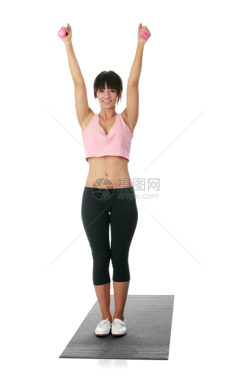 美丽的年轻女子锻炼运动哑铃保健女性温泉平衡乐趣卫生享受瑜伽女士图片