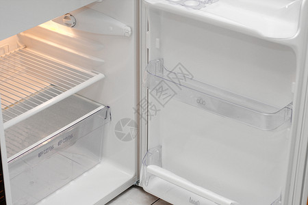 冰箱电子产品饮食家庭跑步白色器具冻结盒子厨房食物背景图片