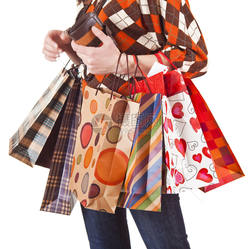 抱着购物袋的快乐妇女销售商业开支顾客女性购物图片