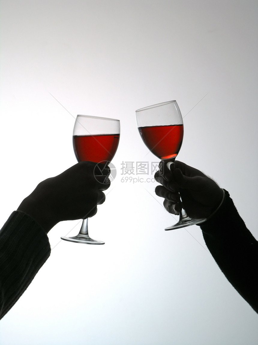 喝葡萄酒的一对夫妇两个人庆典财富公司食物酒杯男士女性团结底土图片