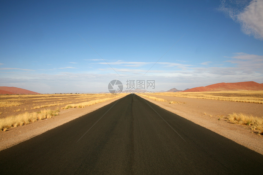 纳米比亚公路旅行土地风景小路岩石环境速度天空地平线日出图片