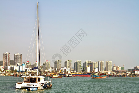 中国三亚凤凰岛港游客旅游工作绿色城市地标运输壁垒热带旅行背景图片