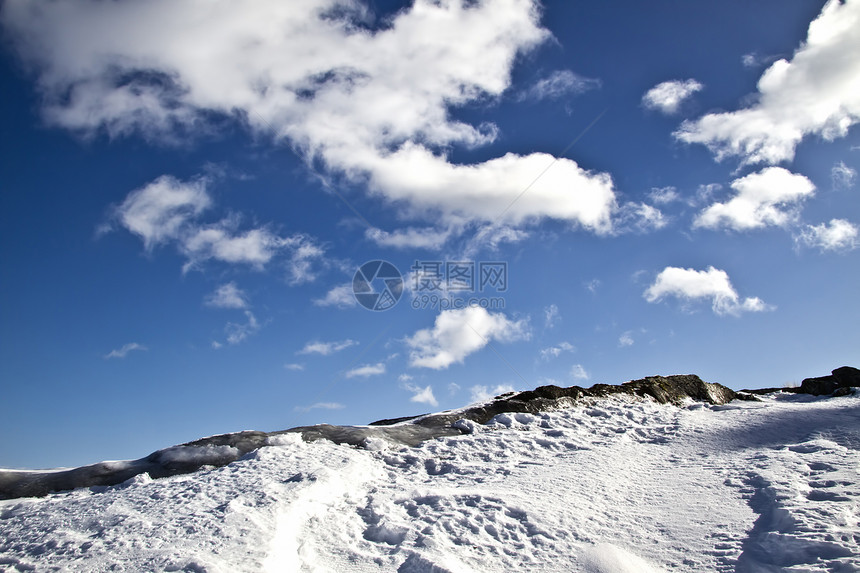 冬季风景天空太阳漂移蓝色季节阳光阴影滑雪晴天图片
