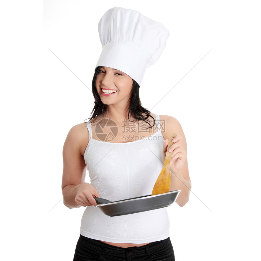 年轻妇女烹饪健康食品牙齿微笑女性女士活力快乐妻子食物蔬菜菜肴图片