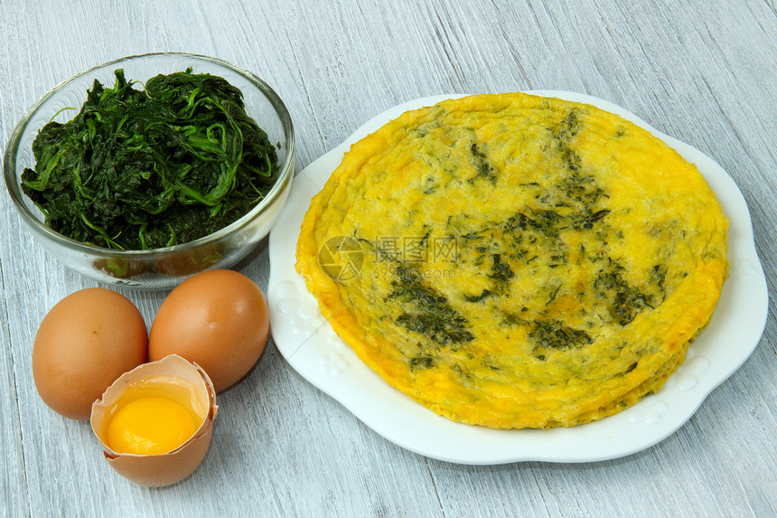 蛋浆桌子盘子环境菠菜绿色低脂肪饮食早餐设置蔬菜图片