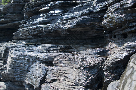 岩石石头壁架悬崖侧翼衬套绿色爬坡背景图片