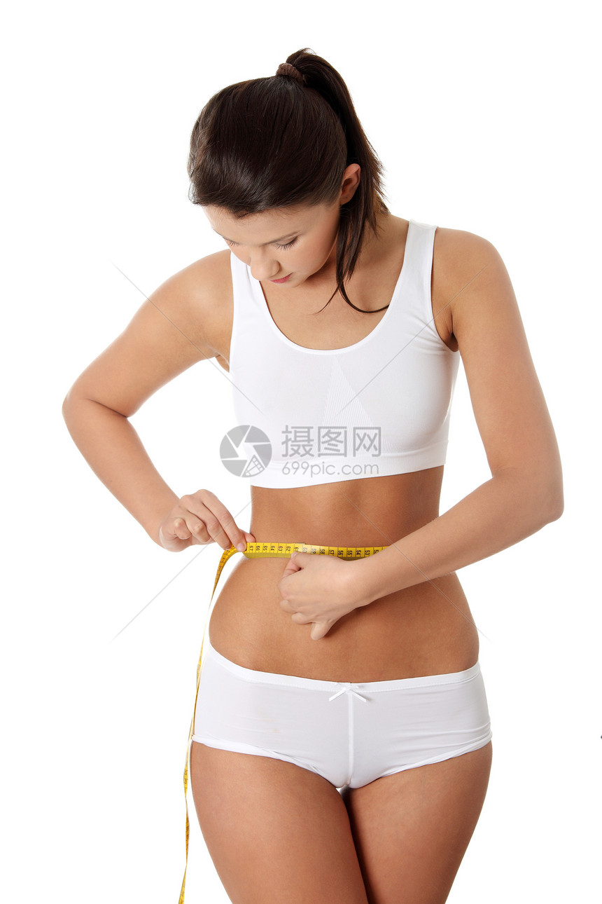 健康的生活方式概念女性运动营养数字磁带减肥测量饮食训练女孩图片